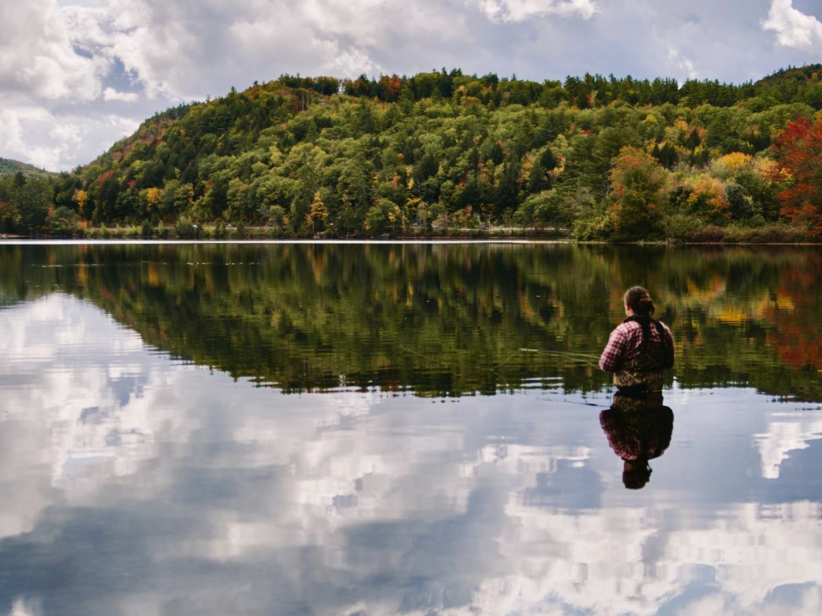 Wading quietly out on a loch is advantageous when targeting wild trout with a fly rod which always requires a degree of stealth for success.